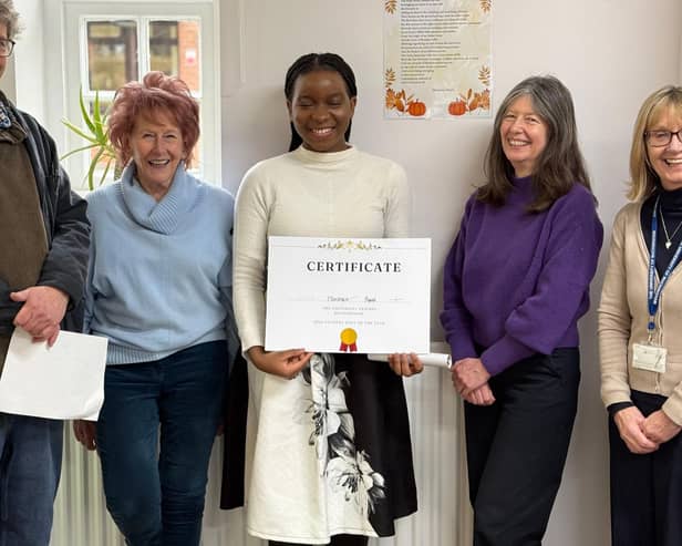 Competition winner Hortence with the judges and organiser of the competition