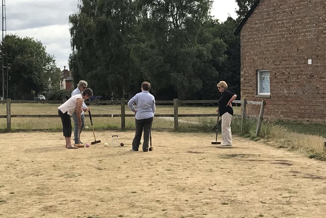 Members playing at Winslow Croquet Club