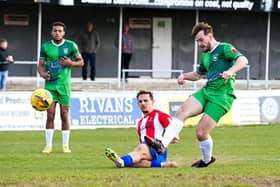 Harry Jones scoring the third goal for Ducks against Kempston Rovers Picture by Mike Snell