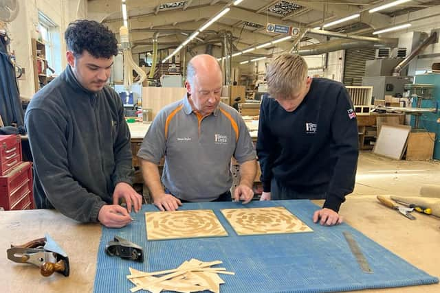 Managing director Simon Taylor with Lorenzo dell Aquila (left) and Sam Brandon (right)