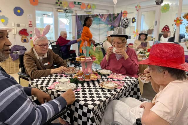 Residents Margaret, Valerie, Albert and Sally at HC-One’s Capwell Grange Care Home enjoying their Mad Hatter’s themed tea party in celebration of National Tea Party Day
