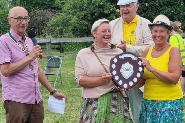 Padbury Paddlers Jan Billings and Catherine Miah collect their award