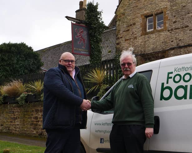 Richard Gordon of Greedy Gordons with Kettering Foodbank volunteer driver Ken Ansdell.