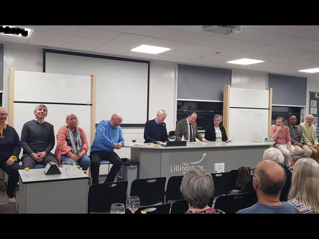 From left: Town team Jane Mordue, Giles Stacey, Marilyn Coxhill, Roger Perkins, question setter Alan Heath, quizmaster Greg Smith, scorekeeper Heather Heath, and Gown team James Slater, Obinna Edeji and Gavin Love