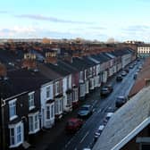 Terraced houses and rooftops Peter Byrne/PA Wire