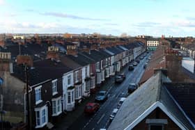 Terraced houses and rooftops Peter Byrne/PA Wire