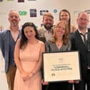 Sarah, George and the Cornwall Place Kitchen team receiving the award