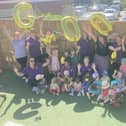 The children and team at Kiddi Caru Day Nursery in Leighton Buzzard celebrating their ‘Good’ Ofsted 