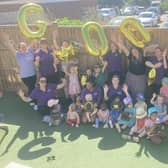 The children and team at Kiddi Caru Day Nursery in Leighton Buzzard celebrating their ‘Good’ Ofsted 