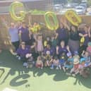 The children and team at Kiddi Caru Day Nursery in Leighton Buzzard celebrating their ‘Good’ Ofsted 