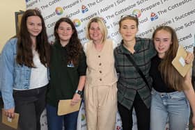 Top performing students Laura Clark-Monks,  Eleanor Tollyfield, Emma List and Tallulah Cotgrave with Mrs Smith Deputy Head of Sixth Form (middle).
