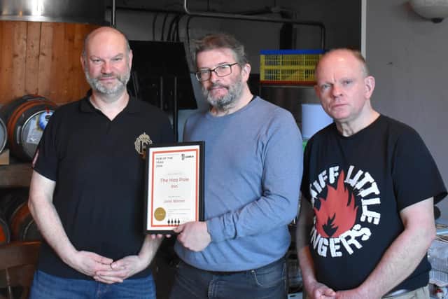 The Hop Pole: Pictured: (left to right): Ian Matthews (licensee), Mike Clarke (branch chair), Simon Allen (branch committee member)