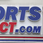 The logo of of Sports Direct. (Photo by Daniel LEAL / AFP) (Photo by DANIEL LEAL/AFP via Getty Images)