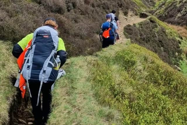 Students trekking through the Peak District