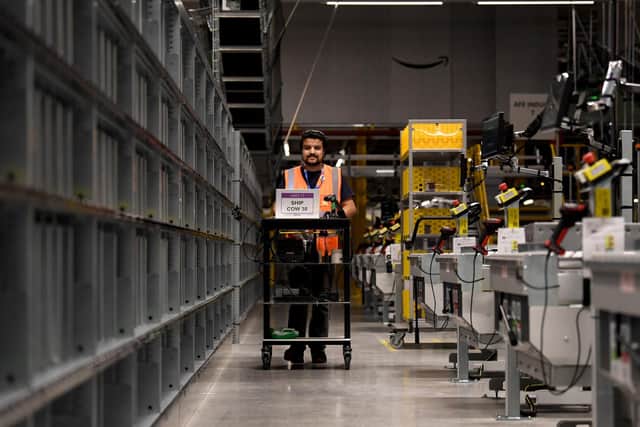 Tour of new £500m Amazon fulfilment centre on outskirts of Leeds. Workers pictured in the factory. Picture taken by Yorkshire Post Photographer Simon Hulme