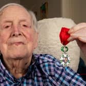 106 year old Leslie Lemon with his Legion of Honor medal. Photo: James Linsell Clark / SWNS