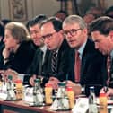 British Prime Minister John Major (4th L) gives the opening speech at the Bosnian Peace Implementation Conference 8 December, in Lancaster House, with (from L) delegation members Madeleine Albright from the US.,  British Minister for Former Yugoslavia  Sir Nicholas Bonsor, British Foreign Secretary Malcolm Rifkind, British Secretary for Defence Michael Portillo and French Foreign Minister Herve de Charette. AFP PHOTO (Photo credit JOHNNY EGGITT/AFP via Getty Images)