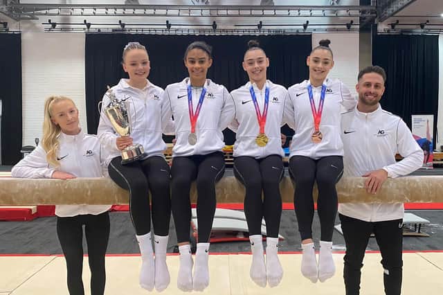 Coaches Molly and Joshua Richardson with Jessica Daykin, Ondine Achampong, Jessica Gadirova and Jennifer Gadirova