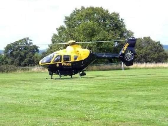 Image of police helicopter used for illustrative purposes