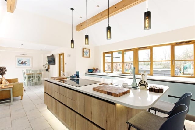 Kitchen breakfast area with wide range of units and integrated appliances