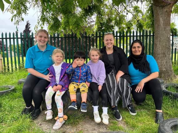 Children with early years staff at Beech Green Nursery   