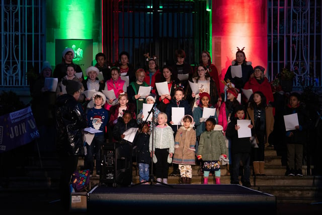 Aylesbury - Christmas on the Cobbles - lights switch on and illuminated parade - Bucks Music Trust entertain the crowd with festive song