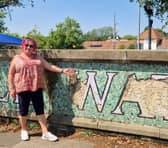 Councillor Sherrilyn Bateman at the Hazell Watson and Viney Mosaic. Photo from Freya Jones