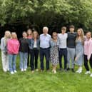 Round of applause - Stefan Anderson (principal), Elizabeth Odell (director of studies), and Dr Sarah Coren (head of sixth form) with A Level students. Image Tring Park School.
