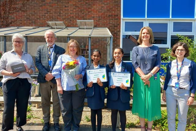 Aylesbury High School students Anushri and Padmasri collect their prizes