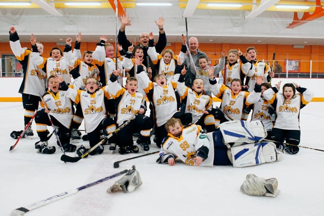 A former Sutton Sting side pose for a team pic.