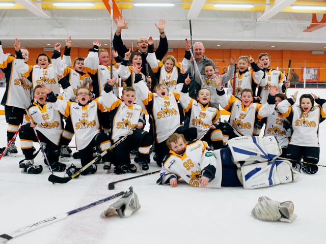 A former Sutton Sting side pose for a team pic.