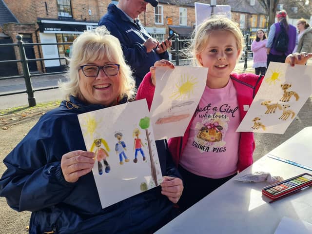Molly Howkins and Nanna Jo show off their artwork
