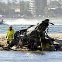 Two helicopters collided on the Australian Gold Coast, killing several passengers and critically injuring three others.