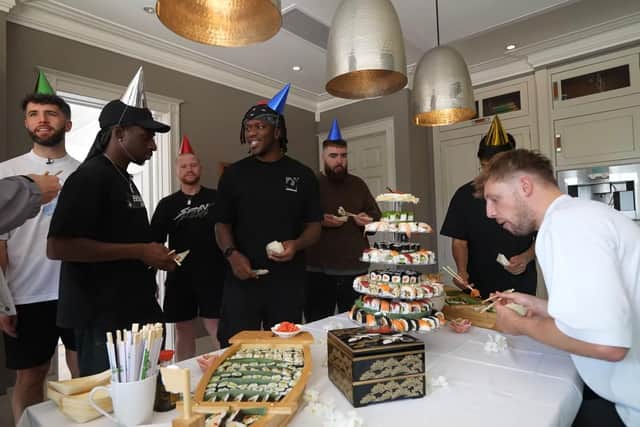 The Sidemen and KSI tucking into the sushu