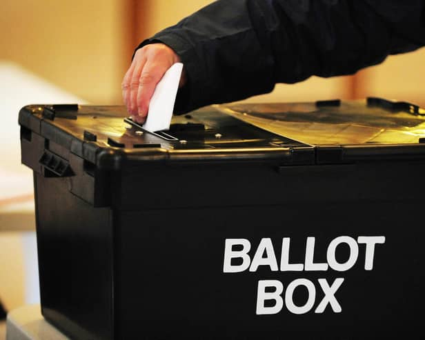 A voter places a ballot paper as the General Election got underway across the UK. Photo from Rui Vieira/PA Images