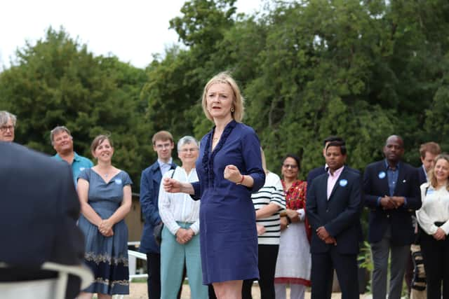 Liz Truss addresses party members