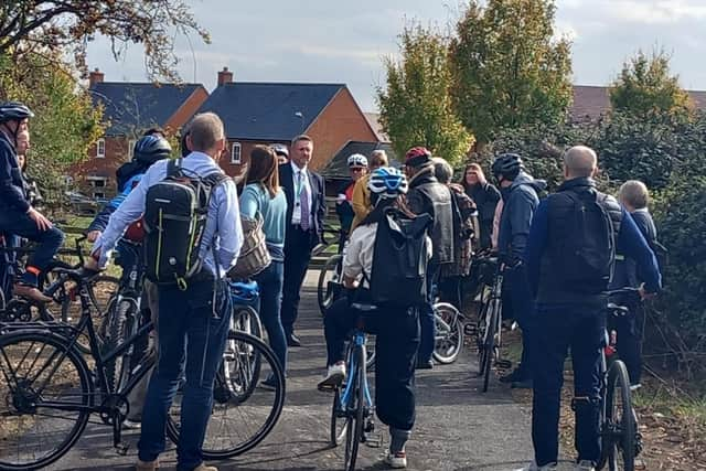 The first cyclists to use the path