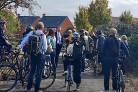 The first cyclists to use the path