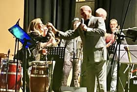 Gary Wilmot is thanked by organiser Corrina Silvester after performing at a charity gig in Stewkley at the weekend. Photo by Karen Gurnett.