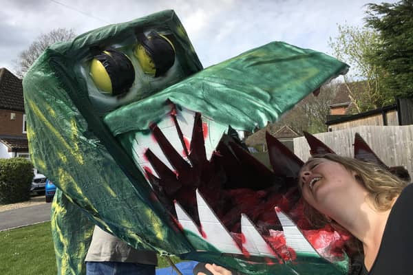 Watch the story of St George and the dragon being re-enacted outside the Old Gaol
