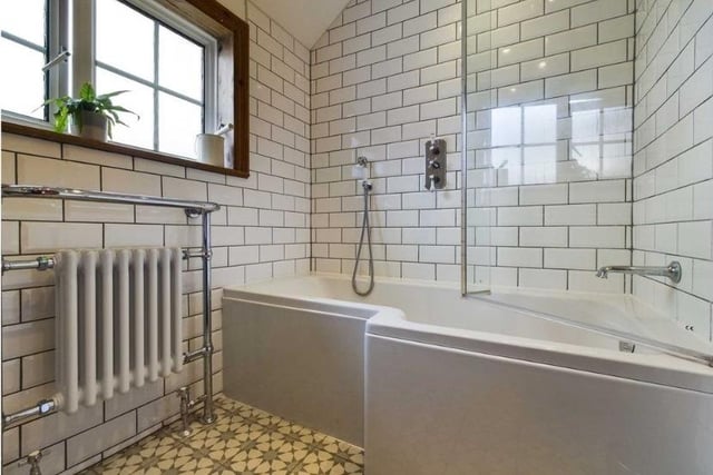 The bathroom with P-shaped bath
