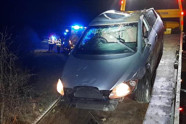 The car is removed from the crash site