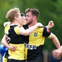 Celebrations and congratulations after Jamie Rudd scored the opening goal for Ducks against Bedford Town  Picture by Mike Snell