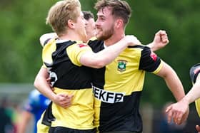 Celebrations and congratulations after Jamie Rudd scored the opening goal for Ducks against Bedford Town  Picture by Mike Snell