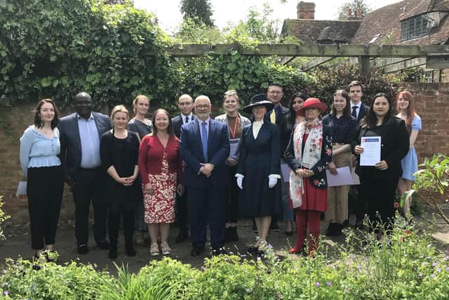 Cenre from left: University clinical legal education manager Julie O'Shea in the red cardigan, associate dean of law Prof Adolfo Paolini, High Sheriff Debbie Brock and Law Clinic director Dr Jocelynne Scutt with students and staff