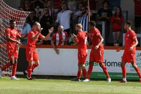 Callum Stead celebrates after he opened the scoring in Brackley Town's 2-0 win over Scarborough Athletic on the opening day of the season. Picture by Peter Keen