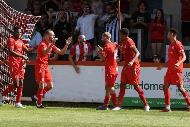 Callum Stead celebrates after he opened the scoring in Brackley Town's 2-0 win over Scarborough Athletic on the opening day of the season. Picture by Peter Keen