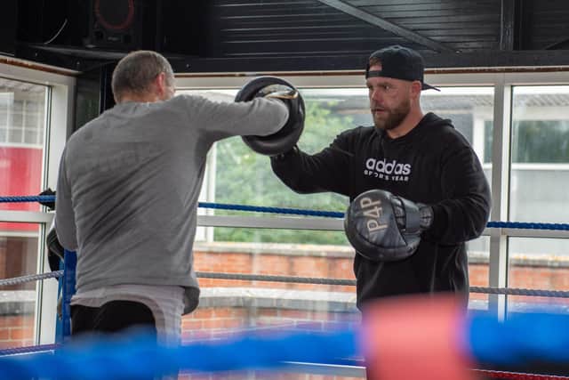 Billy Joe Saunders holding the pads in Aylesbury, photo from Sunny Mandair