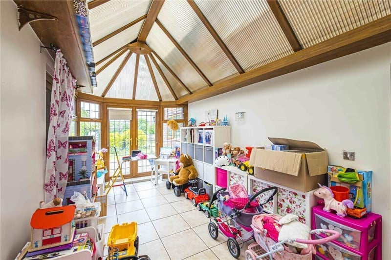 The conservatory has doubled as a play room, as you can see from the toys, but it could double as a library or place to play vinyls.