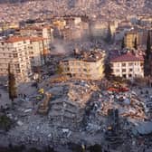 An aerial photo shows collapsed buildings in Antakya on February 11, 2023, after a 7.8-magnitude earthquake struck the country's southeast  (Photo by Hassan AYADI / AFP) (Photo by HASSAN AYADI/AFP via Getty Images)